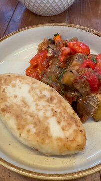 Meat patty with eggplant gravy
