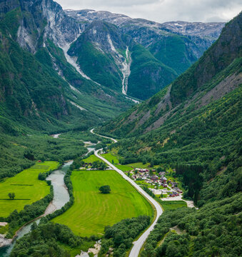 Aerial view of Gudvangen village at the end of the spectacular Naeroyfjord in Norway, surrounded by steep mountains dramatic landscape of the UNESCO World Heritage fjord region