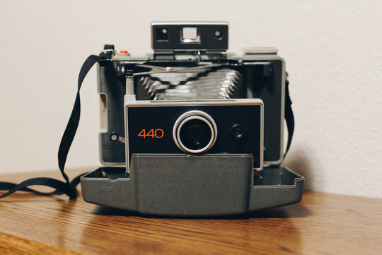 Polaroid 440 Automatic Land Camera on a wood table, Sedalia, Missouri, May 2026