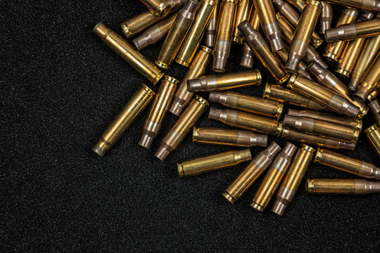 Brass bullet casings on foam background