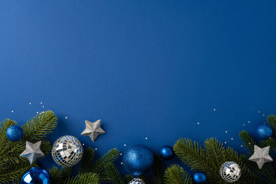 Merry Christmas and Happy New Year blue holiday border with pine branch and ornament decoration