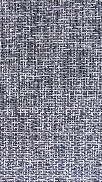 Gray woven placemat texture macro background details abstract fabric pattern.This textured kitchen textile sheet is suitable for modern home dining room design or restaurant menu backdrop.