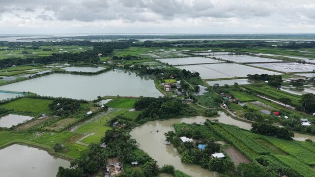 Aerial View of Homes Surrounded by Floodwater in Rural Bangladesh