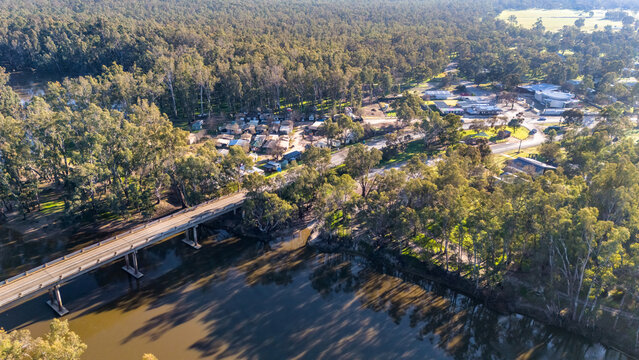 Barmah in Victoria, Australia - Aerial image of the rural township surrounded by dense eucalyptus woodland, with the Murray River, a water tower in Northern Victoria
