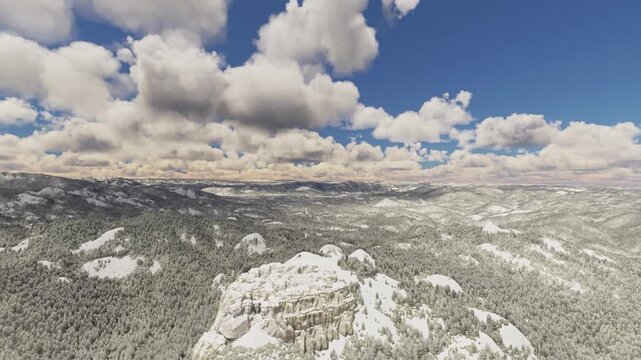 Side aerial drone shot of the snow at Mount Rushmore National Memorial in Keystone. South Dakota. United States