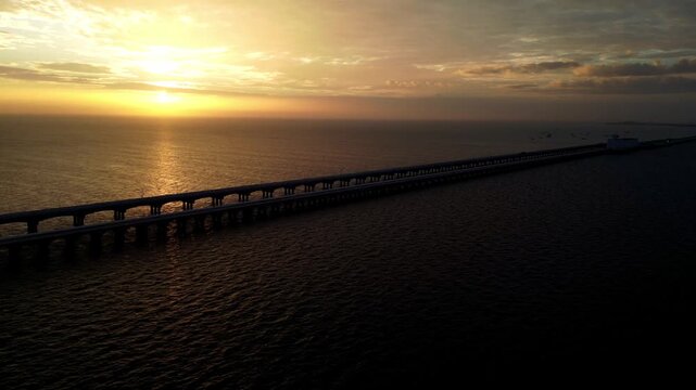 Golden sunset over the long pier at Progreso, Yucatan