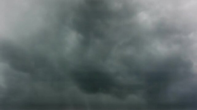 Dramatic Dark Thunderclouds Swirling in Moody Sky Loop