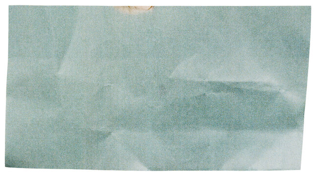 Cut out ocean green piece of magazine page, crumpled paper scrap isolated for scrapbook collage