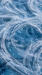 Obraz premium Ice Racing Skid Marks Sweeping Across Blue Frozen Lake for Abstract Motorsport Background and Design