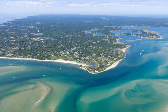 The North Atlantic Ocean washes against the beautiful coast of Chatham on Cape Cod, Massachusetts. This outer Cape is a popular east coast vacation destination during summer months.