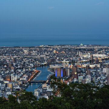 Panoramic night view of Tokushima city center from the summit of Mount Bizan.