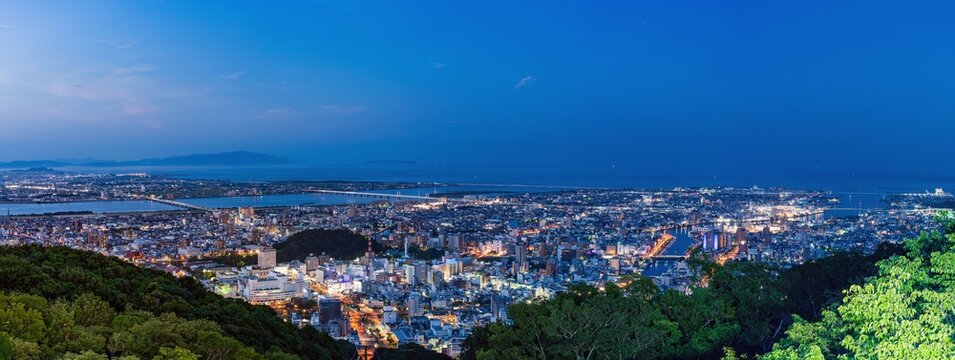 Panoramic night view of Tokushima city center from the summit of Mount Bizan.