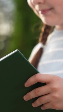girl schoolgirl kid child reading book park, close-up face book, girl schoolgirl kid child reading interesting story school book, educational information young children, historical facts, girl