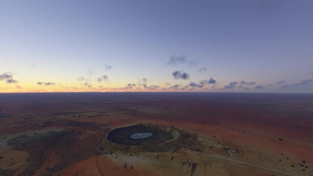 Sunset aerial drone view of Wolfe Creek Meteorite Crater. Australia