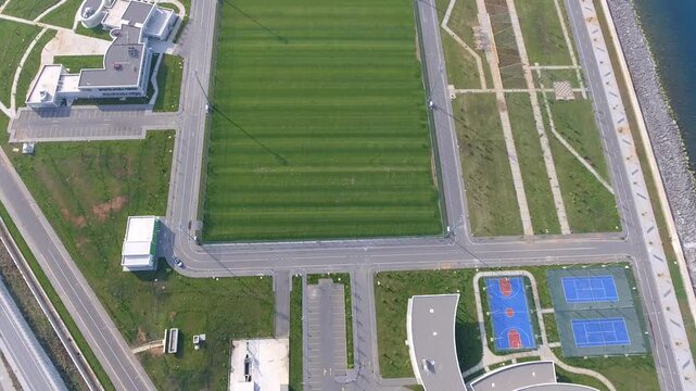 Trabzon Akyazi sports complex Turkey aerial drone view near Black Sea coast stadium area.