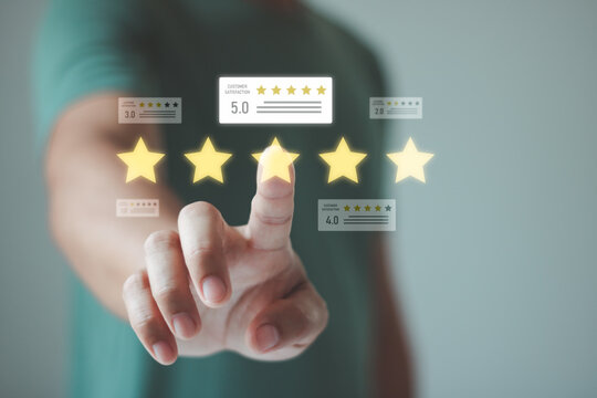 Customer satisfaction concept with a hand selecting five star rating, positive review, and high service quality score, representing feedback, reputation, trust, customer experience, business success.