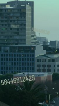 Animation of numbers and data processing over cityscape