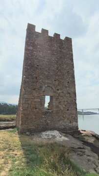 West catoira towers a medieval landmark in spain.Ancient stone ruins of the west catoira towers standing on the ulla river in Galicia, Spain, a medieval fortification complex against viking attacks