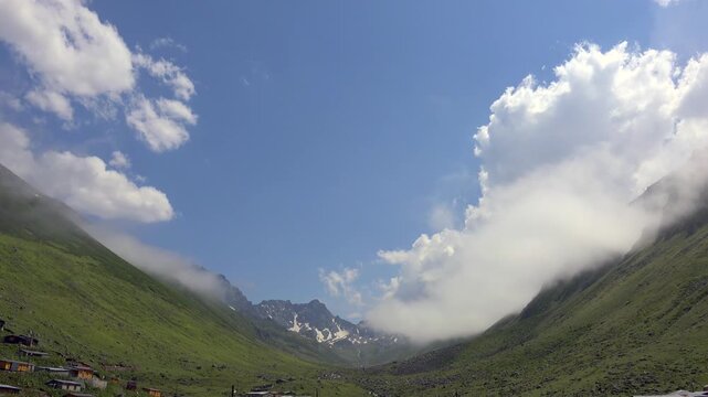 Timelapse fog clearing across U shaped valley, Kackar Mountains, Kavrun plateau, Rize Turkey.