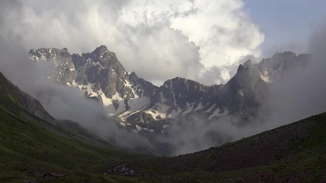 Kackar summit in Rize Turkey rises above mist with rugged mountain highland ridges.