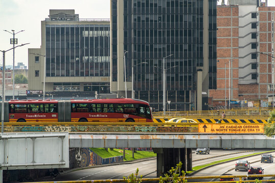 Bogota, Colombia, 03, 08, 2025. TransMilenio bus crossing urban highway