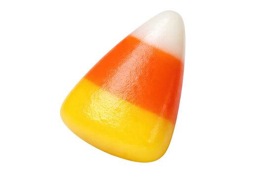 Candy corn close-up, orange yellow white Halloween sweet isolated on white background, festive autumn candy food photo