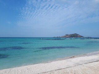 Biyangdo Across Turquoise Sea from Geumneung Beach in Jeju © LEJ