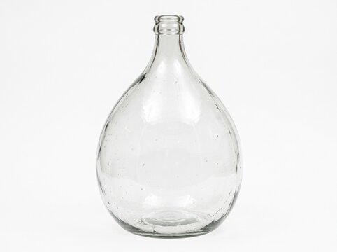 Clear Glass Demijohn Bottle with Bubbles Isolated on White Background
