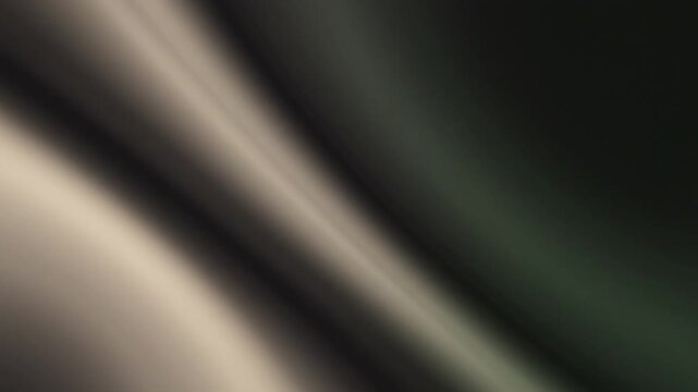 Abstract background with soft diagonal light beams and cinematic glowing rays.