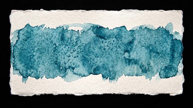 Blue watercolor brush stroke texture on textured white handmade paper