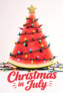 Creative christmas tree made from a watermelon slice with colorful lights and star decoration