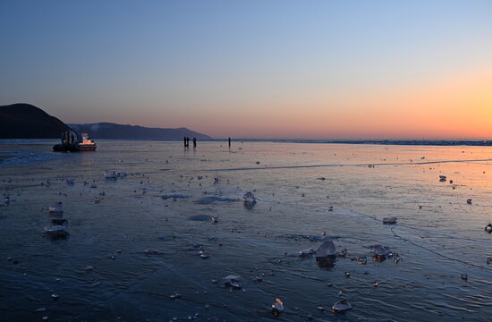 Sunrise on Lake Baikal in winter. Olkhon Gate Strait, Eastern Siberia, Russia