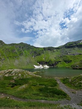 Vertical panoramic view of Balea glacial lake in Fagaras mountains, Romania