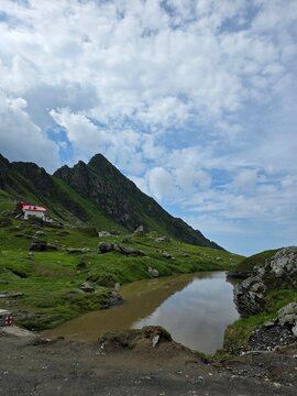 Mountain chalet near a glacial lake in Fagaras mountains, Romania