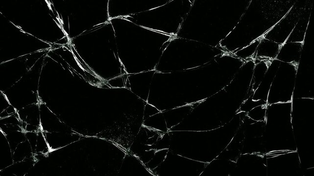 Abstract shattered glass background with bright crack lines on black, hand drawn digital stop motion animation seamless loop