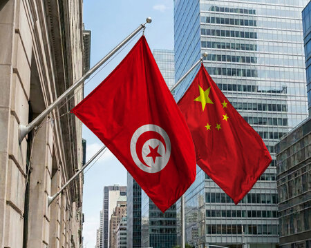 Tunisia and China crossed national flags waving against a blue sky, representing bilateral relations and diplomacy. 3D illustration.