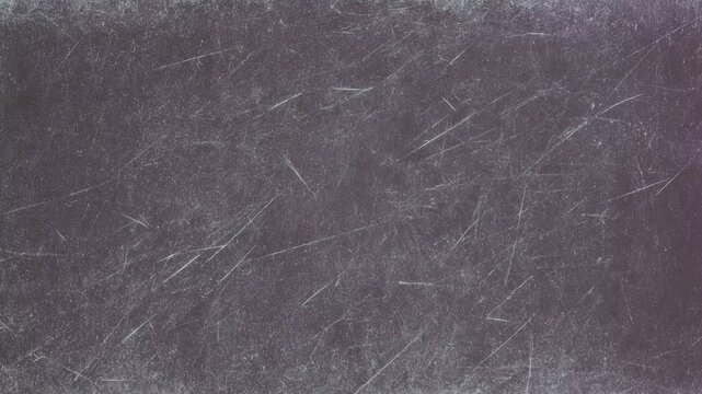 Grungy scratched dark texture background, abstract distressed backdrop, seamless loop
