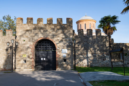 Gates of the fortress of the ancient city of Pitiunt on a sunny morning. Pitsunda, Abkhazia