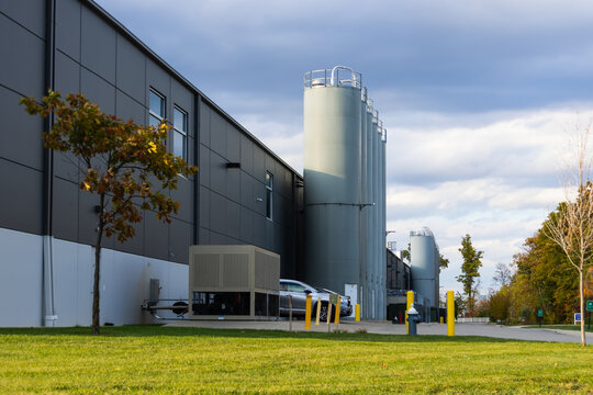 Modern industrial building with multiple storage silos