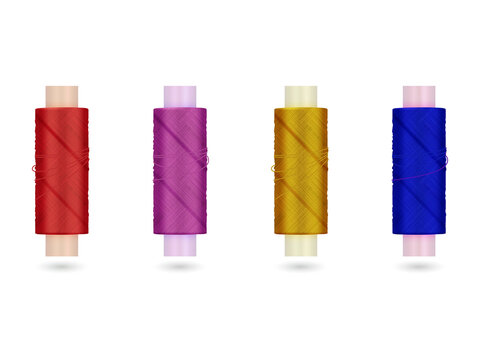 Colorful spools of thread on white cylindrical bases on transparent background