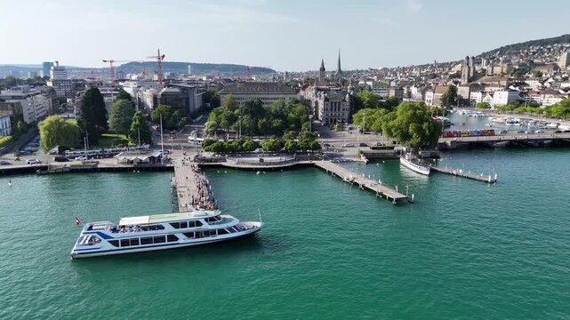 Lateral skyline drone from Bellevue toward Zurich Opera