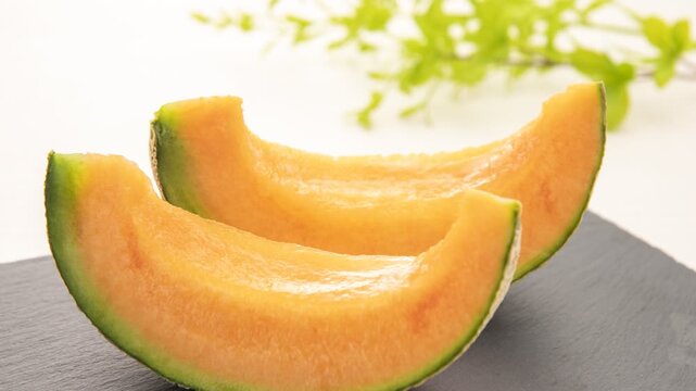 Close Up of Ripe Red Melon Flesh with Seeds and Dripping Juice Juicy Cantaloupe Sizzle Shot

