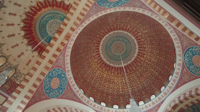 intricate arabic calligraphy artwork on grand mosque dome