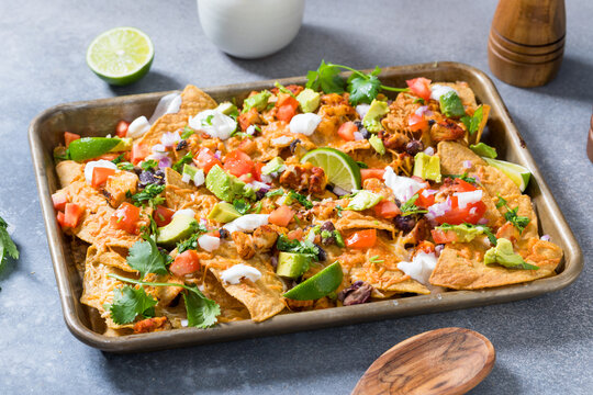 Homemade Chipotle Chicken Nachos with Cheese