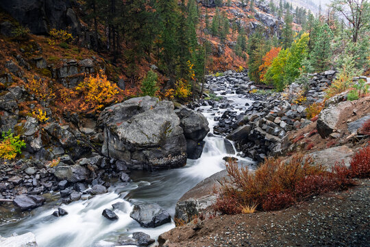 Wenatchee River rapids flowing through Tumwater Canyon in autumn