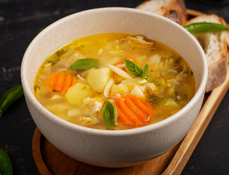 Mediterranean Style Chicken Orzo Soup with Vegetables