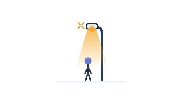 A street lamp turns on automatically as a pedestrian approaches.