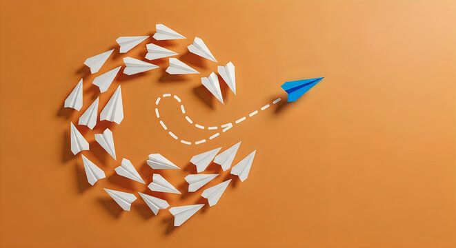 A blue paper airplane breaking away from a group of white paper airplanes on an orange background, representing leadership, innovation, and change