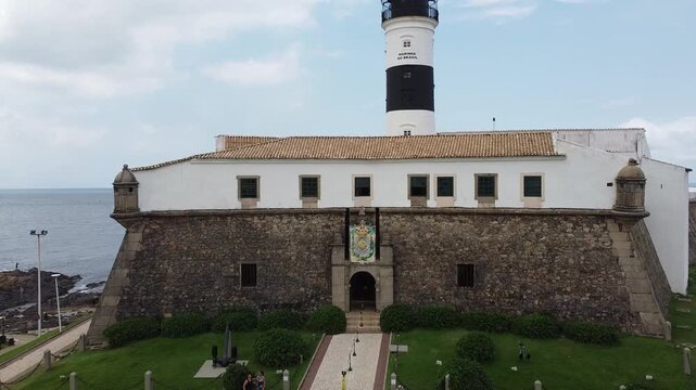 Drone footage Aerial view Barra Lighthouse (Farol da Barra), Salvador, Bahia state | Brasil