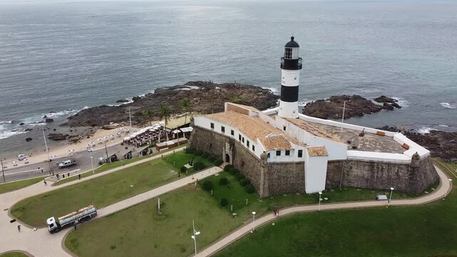 Drone footage Aerial view Barra Lighthouse (Farol da Barra), Salvador, Bahia state | Brasil